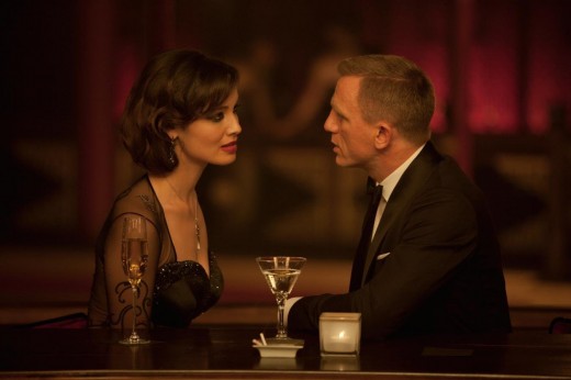 James Bond having drinks with a beautiful woman. Image from Amazon.com.